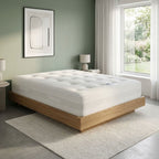 Dreamnap 1000 Pocket Sprung Mattress displayed on a wooden bed frame in a bright modern bedroom.